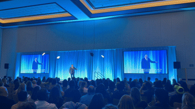 New Jersey Education Association Conference live real-time captioning on main stage screens